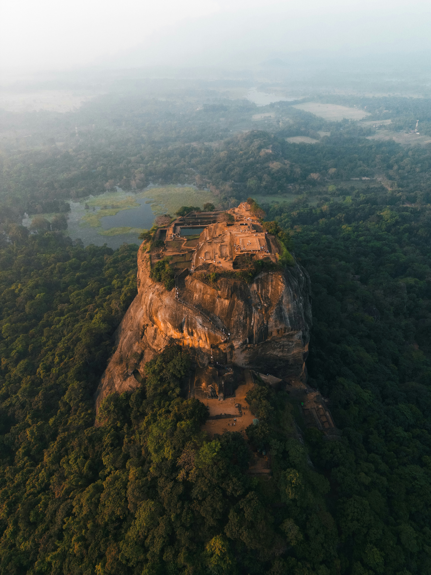Sigiriya Rock Fortress aerial view surrounded by lush Sri Lankan jungle